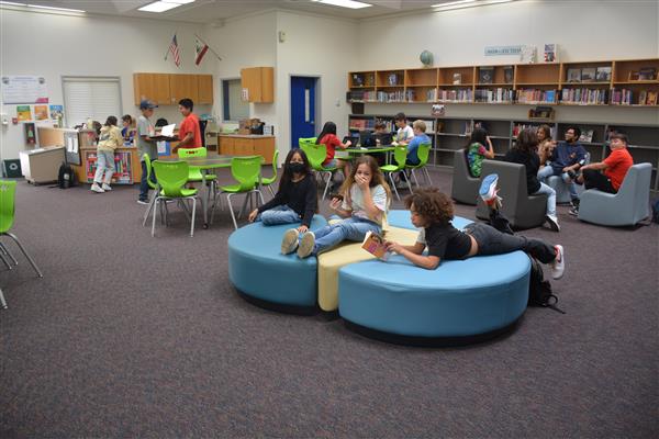More Students enjoying our new Library furniture